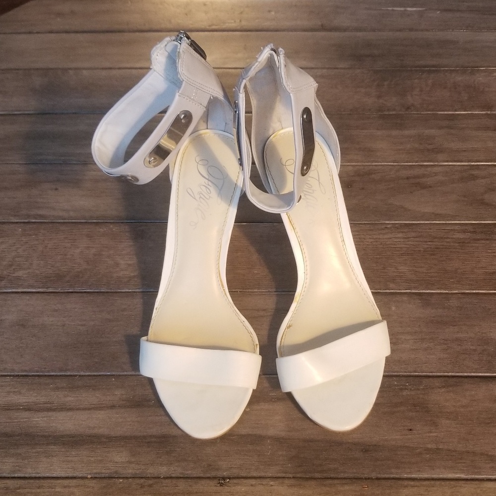 Fergie white leather open toe ankle strap sandal.